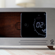 Illustration for article titled An Alarm Clock/Charger You'd Want to Slide Your iPhone Into